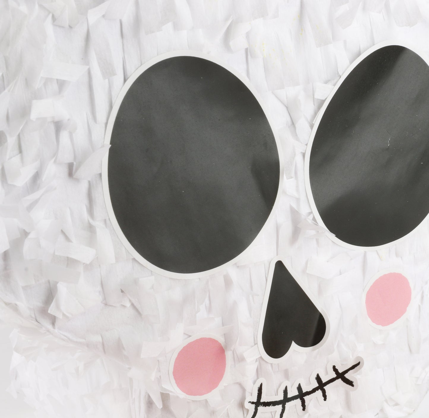 SKULL PINATA WITH FACE STICKERS